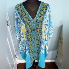 Nwot Women’s Summer V-Neck Coverup One-Size Perfect Condition! No Flaws! Perfect For The Beach Or Pool. Oversized And Light! Gem Detail On The Front. Split On Sides Please Let Me Know If You Have Any Questions. Same-Day Shipping. Light Blue V-neck Top For Vacation, Light Blue V-neck Top For Beach Season, Stretch V-neck Top For Beach Cover-up, Blue V-neck Top For Vacation, Blue V-neck Top For Beach, Blue V-neck Beach Tops, Blue V-neck Tops For The Beach, Blue V-neck Top For Beach Cover-up, Kaftan Short Dress