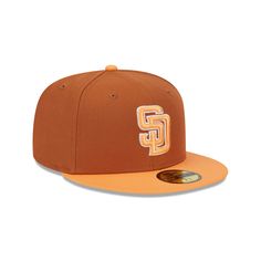 The San Diego Padres Color Pack Earthy Brown 59FIFTY Fitted Cap features an embroidered Padres logo at the front panels with a matching MLB Batterman logo at the rear, an orange glaze visor, and a gray undervisor. Orange Curved Brim Sports Hat, Orange Curved Brim Baseball Cap For Sports, Orange Adjustable Hat With Embroidered Logo, Adjustable Orange Hat With Embroidered Logo, Orange Sports Cap, Orange Snapback Hats For Sports Events, Padres Logo, Orange Glaze, World Baseball Classic