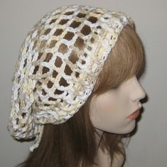 "This is nice for summer. Gets your hair out of the way and will let air flow for the hot months. Made with cotton and should be hand washed and lay flat to dry. Measures 12\" across and 12\" deep. Comes with a drawstring and lock. Holds long hair and dreads." White Yarn Crochet Hat For Festivals, Cotton Crochet Beach Hat One Size, One Size Cotton Crochet Hat For Beach, Beach Crochet Cotton Hat One Size, Bohemian Cotton Crochet Hat One Size, Bohemian Crochet Cotton Hat One Size, Bohemian Crochet Hat In Cotton One Size, Bohemian White Cotton Yarn Crochet Hat, Beach Crochet Cotton Hat