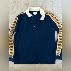 Boys Gucci Long Sleeve Polo Size 10 Navy And Beige Logos Down The Sleeves Gucci Long Sleeve Tops With Logo Print, Gucci Long Sleeve Work Shirt, Gucci Long Sleeve Top With Logo Print, Blue Long Sleeve Gucci Sweater, Gucci Cotton T-shirt With Graphic Print, Gucci Shirts, Boys Top, Long Sleeve Polo, Kids Shirts