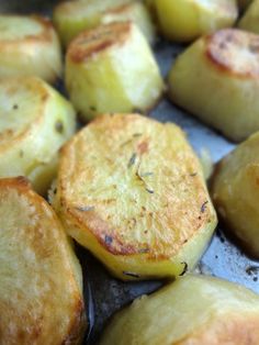 some cooked potatoes sitting on top of a pan