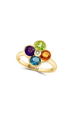 Show off dazzling sparkle in this 14-karat yellow-gold flower ring featuring semiprecious stone petals centered by a dainty bezel-set diamond. 1/2" diameter setting Total diamond weight: 0.02ct. Color: H–I Clarity: I1–I2 14k gold/citrine, London blue topaz, amethyst and/or peridot/diamond Made in the USA Diamond Guide 14k Yellow Gold Diamond Ring With Gemstone Accents, 14k Yellow Gold Flower Ring With Birthstone, Yellow Gold Flower Ring With Birthstone In 14k Gold, 14k Gold Flower Shaped Gemstone Rings, Yellow Gold Flower-shaped Multi-stone Rings, Yellow Gold Flower-shaped Rings With Multi-stone, Yellow Gold Floral Multi-stone Rings, Yellow Gold Flower Ring With Gemstone, Yellow Gold Flower Ring With Birthstone