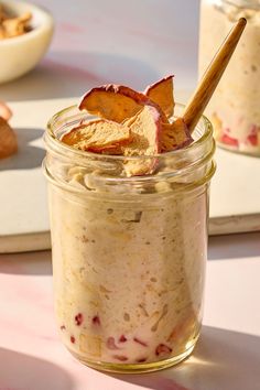 a jar filled with food sitting on top of a table