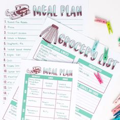 three printable meal plans on top of each other next to markers and pencils