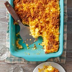 a casserole dish with meat and cheese on it