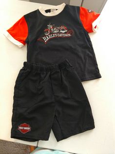 Harley Davidson Black, Orange & White 2 Pc. Shorts Outfit 4T. Condition is Pre-owned. Shipped with USPS First class mail. Cotton Sports Set With Shorts, Cotton Sports Sets In Short Style, Black Cotton Short Set, Harley Davidson Baby, First Class, Short Outfits, Harley Davidson, Mens Short, Baby Clothes