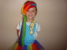 This wig headband was inspired by Rainbow Dash. The crochet headband is teal and the yarn hair is rainbow colors!  What a cute wig for costumes and dress up. Great for your My Little Pony fan! Message me with any questions or if you want a custom length or order.  See the tutu section for the Rainbow Dash inspired skirt. Pink Purple Blue Hair, Cute Wig, Wig Headband, Sally Nightmare Before Christmas, Custom Headbands, Yarn Hair, Wig Hat, Unicorn Dress, Pigtail Braids