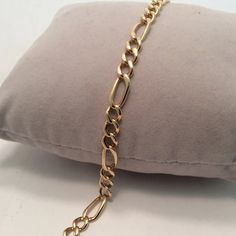 14k Yellow Real Solid Gold Figaro Bracelet 8'' 6mm 10.30gr Metal Type: 14k Solid Yellow Real Gold Weight: 10.30 Grams Width: 6.00mm Wide Length: 8 Inches Long Comes With A Gift Box Luxury Gold Bracelet With Figaro Chain As Gift, Luxury Gold Figaro Chain Bracelet As Gift, Elegant 14k Gold Figaro Chain Bracelet, Luxury Yellow Gold Figaro Chain Bracelet, Luxury 14k Gold Bracelet With Figaro Chain, Classic Figaro Chain Bracelets, Luxury Figaro Chain Bracelet For Formal Occasions, Luxury Formal Figaro Chain Bracelet, Classic 14k Gold Bracelet With Figaro Chain