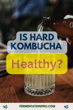 a glass filled with liquid and the words is hard kombucha healthy?