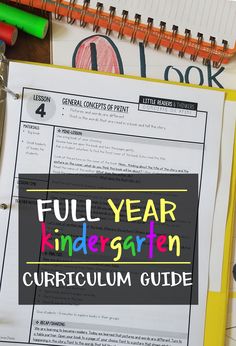 the full year kindergroten map is on top of a desk with school supplies