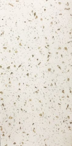 a white counter top with speckles on it