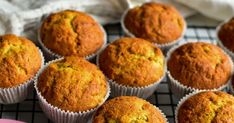 there are many muffins on the cooling rack