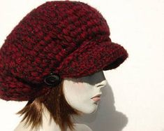 "Style: classic slouchy newsboy hat. It has a solid double-layer brim and a strap with button. Material: a mix of yarns of different structure and color. 10% wool, 10% mohair, 80% acrylic Color: red color hat on this auction but you will find other color options on my auctions. https://www.etsy.com/shop/GreenCatStudio?ref=seller-platform-mcnav&section_id=14355600 Characteristics hat:chunky,soft,warm,cozy,unique Size: Hat Circumference: 22\" - 23\" Hat Height: 10\" You can also buy a hat with Red Knitted Brimmed Hat, Slouchy Red Hat For Winter, Red Slouchy Hat For Winter, Red Flat Cap For Fall, Slouchy Red Winter Hat, Red Slouchy Winter Hat, Slouchy Fall Cap Hat, Slouchy Cap For Fall, Casual Winter Crochet Visor Hat