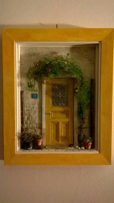 a wooden door with plants growing out of it