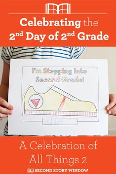 a child holding up a poster with the words celebrating the 2nd day of 2nd grade