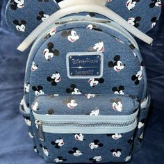 Brand New With Tags And Original Paper Stuffing Still Inside Original Foam Ear Protector Mickey Mouse Denim Print Disney Parks Exclusive Front Zipper Pouch Red Mickey Mouse Print Inside Smoke Free, Pet Friendly Home Casual Minnie Mouse Backpack For Travel, Casual Minnie Mouse Bag For Back To School, Casual Minnie Mouse Back To School Bag, Casual Mickey Mouse Backpack For Back To School, Casual Minnie Mouse Backpack For Disney Trips, Casual Minnie Mouse Backpack, Casual Minnie Mouse Standard Backpack, Casual Mickey Mouse Backpack For Travel, Casual Mickey Mouse Backpack