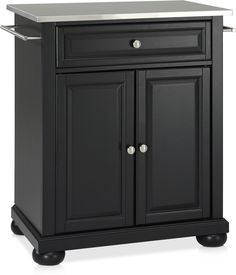 a black cabinet with two doors and one drawer on the bottom, is shown in front of a white background