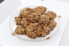 a white plate topped with cookies on top of a table