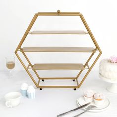 PRICES MAY VARY. [Information] Hexagonal Metal Cake Stand Combining the contemporary charm of hexagonal shape with glossy metallic luster, this eccentric Cake Stand will take your cake or dessert table decoration up by several notches. Add a clean and dynamic presentation to any table top with this 3 Tier cupcake stand that makes a beautiful addition to weddings, birthdays, showers, catered events, and festive events. 3-Tier Display Stand Featuring modern tiered design and eye-catching hexagon s Hexagon Cake Stand, Tiered Cupcake Stand, Gold Cupcake Stand, 3 Tier Cupcake Stand, Appetizer Display, Cupcake Holders, Tiered Cake Stands, Dessert Holder, Cupcake Stand Wedding