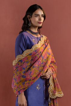 Blue layered kurta with floral embroidered motifs. Paired with embroidered slip, Chanderi pant and printed zari dupatta.
Component: 4
Embroidered
Neckline: Round
Sleeve Length: Three quarter
Fabric: Chanderi, Printed Zari
Color: Blue
Printed dupatta
Front button placket
Note: Potli bag shown in the image is not for sale - Aza Fashions Purple Embroidered Cotton Silk Dupatta, Purple Chanderi Dupatta With Floral Embroidery, Festive Cotton Blouse Piece With Dupatta, Purple Dupatta With Floral Embroidery For Navratri, Floral Embroidered Mulmul Kurta With Traditional Drape, Mulmul Kurta With Floral Embroidery And Traditional Drape, Cotton Blouse Piece With Dupatta For Diwali, Eid Cotton Silk Blouse With Floral Embroidery, Eid Floral Embroidered Cotton Silk Blouse Piece