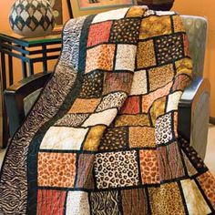 a couch with a blanket on top of it