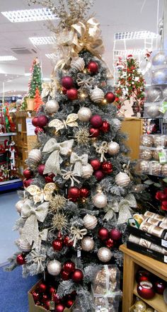 a decorated christmas tree in a store