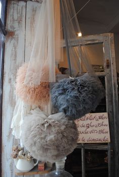 there is a window display with tulle on it