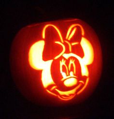 a pumpkin carved to look like mickey mouse