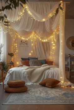 a canopy bed with lights on the ceiling