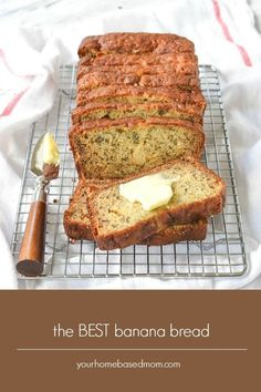 a loaf of banana bread sitting on top of a cooling rack