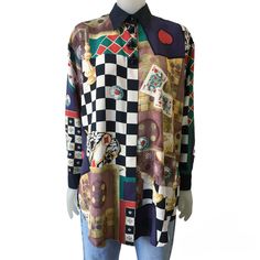 Stunning 1980s vintage shirt / blouse with a beautiful allover print of playing cards and board games, and amazing 3D decorative buttons under the collar. An absolute attention-grabbing piece.  Women's size approximately: L * mannequin is a size S/M and about 180 cm tall * would fit a men's size M, but the sleeves might be short if you are tall, so please compare the shoulder and sleeve measurements with a shirt you already own Please check the all measurements to make sure it will fit : length: Retro Collared Blouse With Graphic Print, Patterned Retro Print Button-up Top, Patterned Graphic Print Button-up Blouse, Patterned Button-up Shirt With Vintage Print, Patterned Vintage Print Button-up Shirt, Vintage Printed Patterned Shirt, Vintage Patterned Printed Shirt, Vintage Multicolor Tops With Unique Print, Vintage Multicolor Top With Unique Print