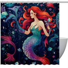 a shower curtain with a mermaid holding a flower