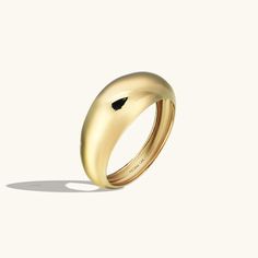 The Bold Dome Ring is modern, fashionable and feminine. An outstanding ring that enhances your style at all times. - Made in 14k Solid Gold- Bottom Width: 3.38 mm / 0.13 inches- Top Width: 8.02 mm / 0.31 inches- Thickness: 1.35 mm / 0.05 inches - This product comes with iconic Norm Jewels gift box Gold Dome Ring, Luxury Jewelry Brands, Bold Rings, Dome Ring, Evil Eye Ring, Linking Rings, Sparkling Rings, Gifts For My Wife, Solid Gold Rings