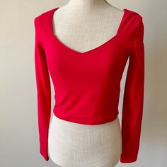 Beautiful Neck Line. Long Sleeve. Cropped Top. Measurements: Chest (Pit To Pit)- 14.5”; Length- 16” 95% Cotton; 5% Spandex. Machine Wash Cold Red Elastane Tops For Spring, Red Stretch Top By Forever 21, Red Stretch Tops From Forever 21, Red Stretch Top From Forever 21, Fitted Red Forever 21 Top, Red Forever 21 Top For Night Out, Red Fitted V-neck Crop Top, Long Sleeve Cropped Top, White Peplum Tops