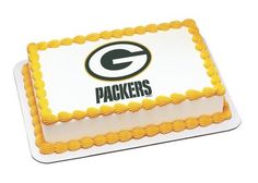 a green bay packers cake with the logo on it