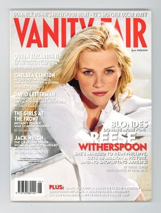 the cover of vanity fair magazine with a blonde woman in white shirt and blue eyes