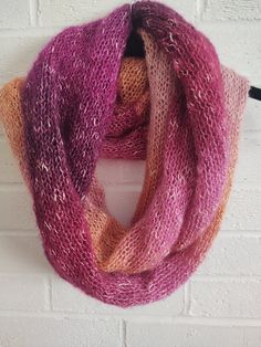 Handmade, lightweight multi-colored infinity scarf.  Lightweight enough to be worn in fall, winter or spring and even on cool summer nights.  Wrap it or leave it long.   When laid flat this scarf measures approximately 14" wide x 33" long - the circumference of the scarf is approximately 66" Made from a acrylic/cotton blend yarn.  Due to the variations in the yarn the placement of the colors may vary.  Would suggest gently hand wash and dry flat Also available in other color: https://branchingwillow.etsy.com/listing/1197348747 One Size Multicolor Infinity Loop Scarf, Pink Bohemian Scarf One Size, Casual Multicolor One Size Infinity Scarf, Casual Multicolor One-size Infinity Scarf, Pink Bohemian Scarves For Fall, Pink Bohemian Scarf For Fall, Handmade Casual Infinity Scarf One Size, Casual Handmade Infinity Scarf One Size, Handmade Multicolor Infinity Scarf One Size