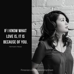 a woman wearing headphones with a brick wall behind her and a quote on it