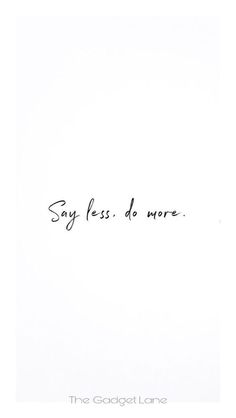 the words say less do more are written in cursive ink on white paper