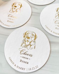 four personalized coasters with dogs on them