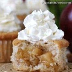 apple pie cupcakes with whipped cream on top