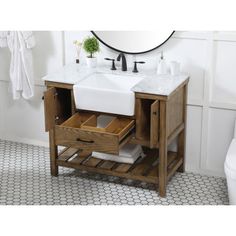 a bathroom vanity with two drawers and a sink