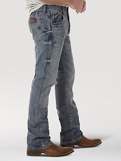 Men's Wrangler Retro® Slim Fit Bootcut Jean Straight Leg Denim Jeans For Ranch, Denim Jeans With Pockets For Ranch, Western Style Straight Leg Denim Bottoms, Rugged Medium Wash Bottoms With Standard Cut Leg, Ranch-style Medium Wash Jeans With Five Pockets, Medium Wash Jeans For Ranch, Medium Wash Bottoms With Pockets For Ranch, Fitted Straight Leg Bottoms For Western-themed Events, Western Style Fitted Jeans With Belt Loops