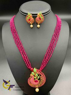 Cute multicolor stones Peacock design pendant with matching pink beads chain Handmade jewelry One gram gold jewelry Silver-plated jewelry Official Website globusfashions.com 🌸 S H O P . M O R E . S T Y L E S 🌸 https://www.etsy.com/shop/Globusfashions Necklaces - https://www.etsy.com/shop/Globusfashions?section_id=18712263 Bracelets - https://www.etsy.com/shop/Globusfashions?section_id=18969767 Pendant Sets - https://www.etsy.com/shop/Globusfashions?section_id=18707402 Tikka - https://www.etsy. Jumka Earrings, Crystal Beads Necklace, Peacock Pendant, Pendant Sets, Chandbali Earrings, Ruby Beads, Beads Chain, Crystal Bead Necklace, Satin Bags