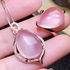 Welcome to Elegant Art Jewelry!  Stone: Natural Rose Quartz Stone Size: ( 13mm×18 Pendant ), ( 12mmx16mm Ring ) Side Stone: Zircon Metal: 925 Sterling Silver Personalization: 9K/14K/24K/GOLD/SILVER/PLATINUM/ROSE-GOLD/WHITE GOLD. (Contact me)  Rose Quartz Pendant, Rose Quartz Cuff Pendant, 925 Sterling Silver Pendant, Oval Shape Pendant, Rose Quartz Pendant, Rose Quartz Engagement, Open Design Pendant, Rose Quartz Oval, Rose Quartz Natural, Pink Rose Quartz, Pink Rose Quartz, Gemstone Pendant, Ro Pink Cabochon Jewelry For Anniversary, Rose Gold Cabochon Pendant Jewelry, Fine Jewelry Pink Cabochon, Pink Cabochon Jewelry For Wedding, Pink Cabochon Wedding Jewelry, Silver Pendent, Necklace Luxury, Luxury Ring, Rose Quartz Jewelry