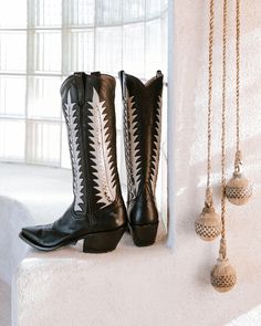 Elevate your style to new heights and effortlessly add a touch of chic to any outfit with our captivating, extra-tall Kate cowboy boots. Inspired by our longstanding love of vintage boots, these harken back to traditional designs, reimagined and elongated to be wildly flattering on the leg. The black leather vamps and color-blocked shaft uppers adorned with jagged, graphic palm leaves make these wear-everywhere boots feel a little rock 'n roll. This boot is part of MC Personalization and can cus Knee High Cowgirl Boots, Miron Crosby, High Cowgirl Boots, Boot Tree, Black Luxury, Luxury Women Fashion, Cowboy Boots Women, Vintage Boots, Palm Leaves