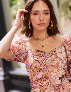 Our Roscoe Top is flirty and perfect for every day. It is fitted to highlight the figure with a front cut-out detail and romantic pull sleeves. Pair it with jeans or cut-offs and sandals for an everyday summer look. Summer Look, Summer Looks