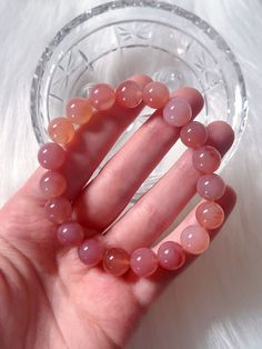 "You will receive one chunky Yan Yuan Agate crystal bracelet. So gemmy and peachy - These beads remind me of gummy candy! This bracelet is made \"one size\" and stretches to fit. Bead size: 11mm Bracelet size: 7mm * * * * * ABOUT YANYUAN AGATE: Yanyuan agate, named after Yanyuan County in Sichuan, China, is a variety of banded chalcedony, a mineral of the quartz family. Yanyuan Agate is one of the most rare Agate. It has a naturally large range of colours. Like all Agate, it is said to helps in Pink Agate Bracelets With 8mm Beads, Pink Agate Round Bead Crystal Bracelet, Agate Gemstone Beads Crystal Bracelet, Round Agate Gemstone Beads Crystal Bracelet, Agate Gemstone Crystal Bracelet With Round Beads, Pink Agate Spiritual Bracelets, Pink Agate Beaded Bracelets, Agate Crystal Bracelet With Gemstone Beads, Round Agate Crystal Bracelet With Gemstone Beads