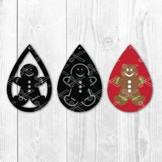 three christmas tears with ginger, black and red designs