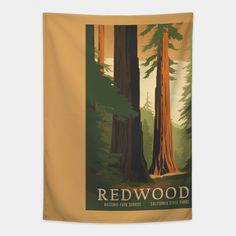 the redwood national park poster is displayed on a wall hanging in front of a beige background